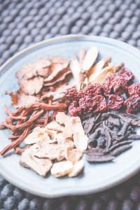 A colorful plate of dried herbs and plants.