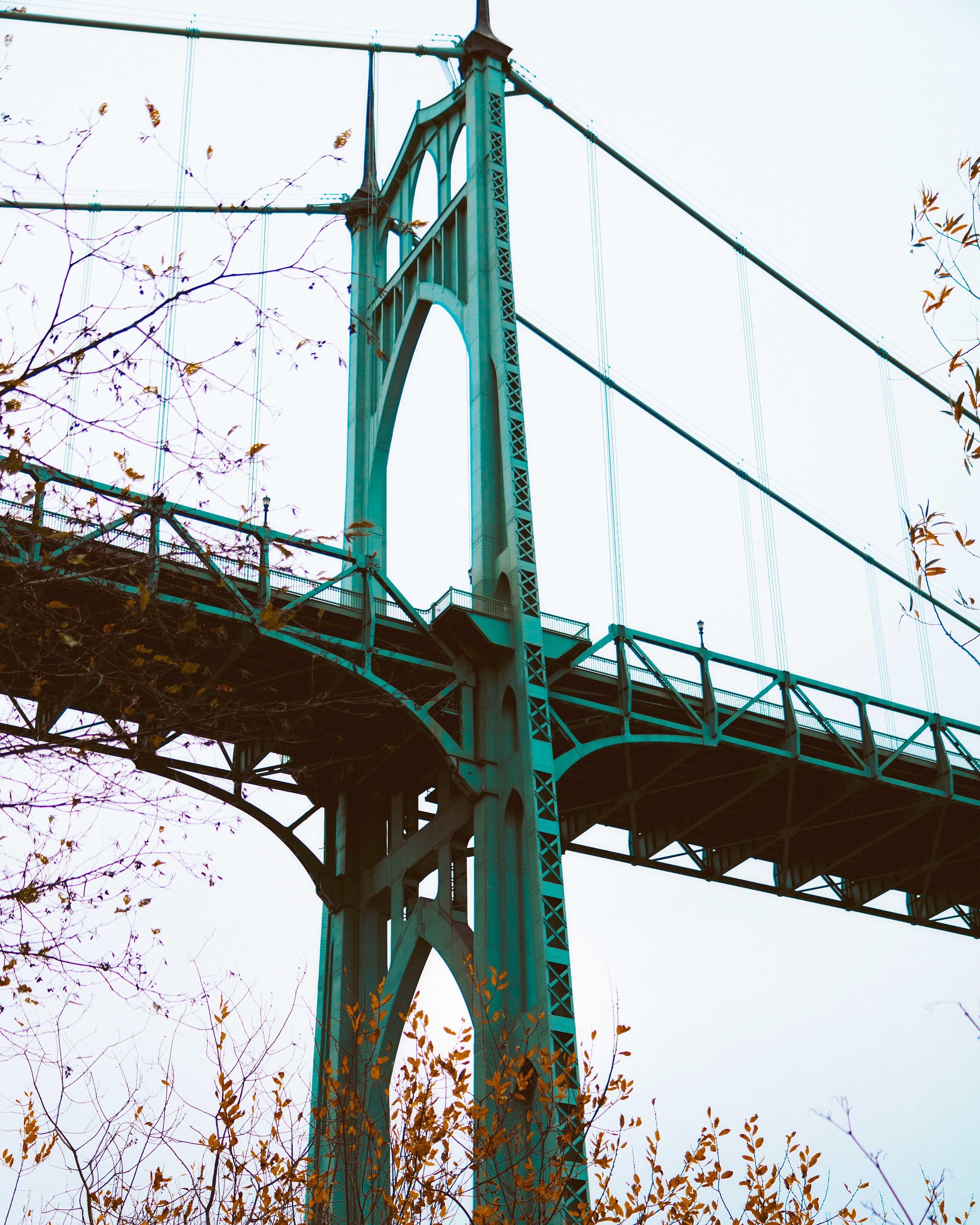 Detail of the green St. John's Bridge in Portland, Oregon in the fall.